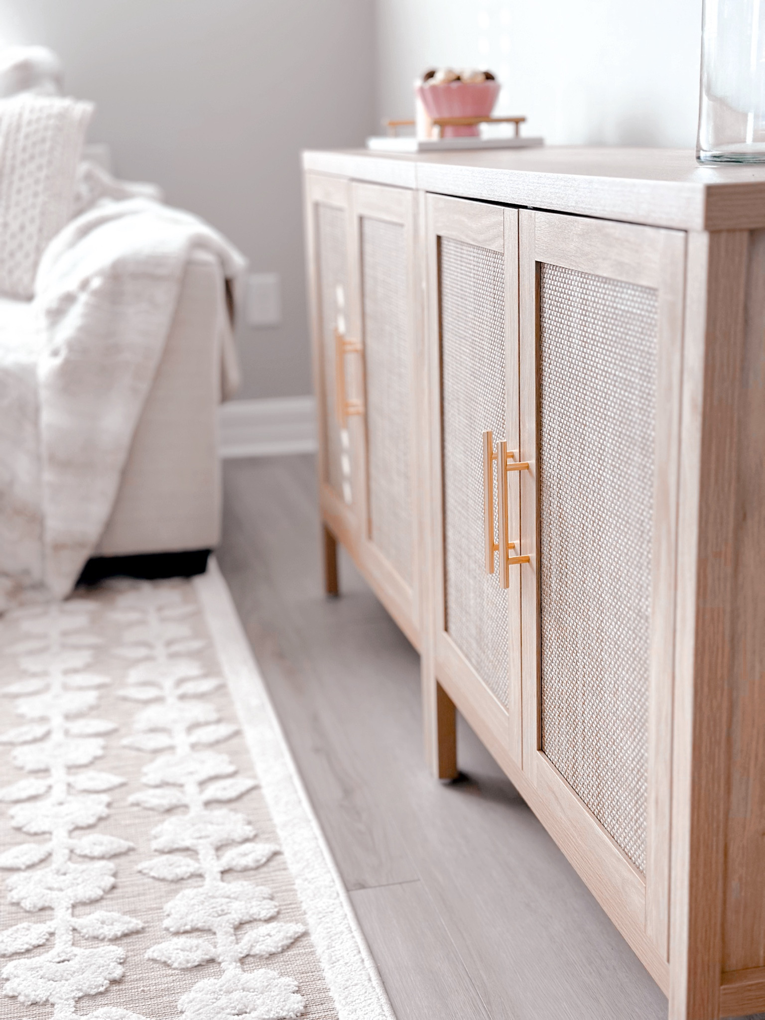 What I chose to use as an entertainment stand for my house. I love the rattan detailing and the gold handles 




#LTKHome