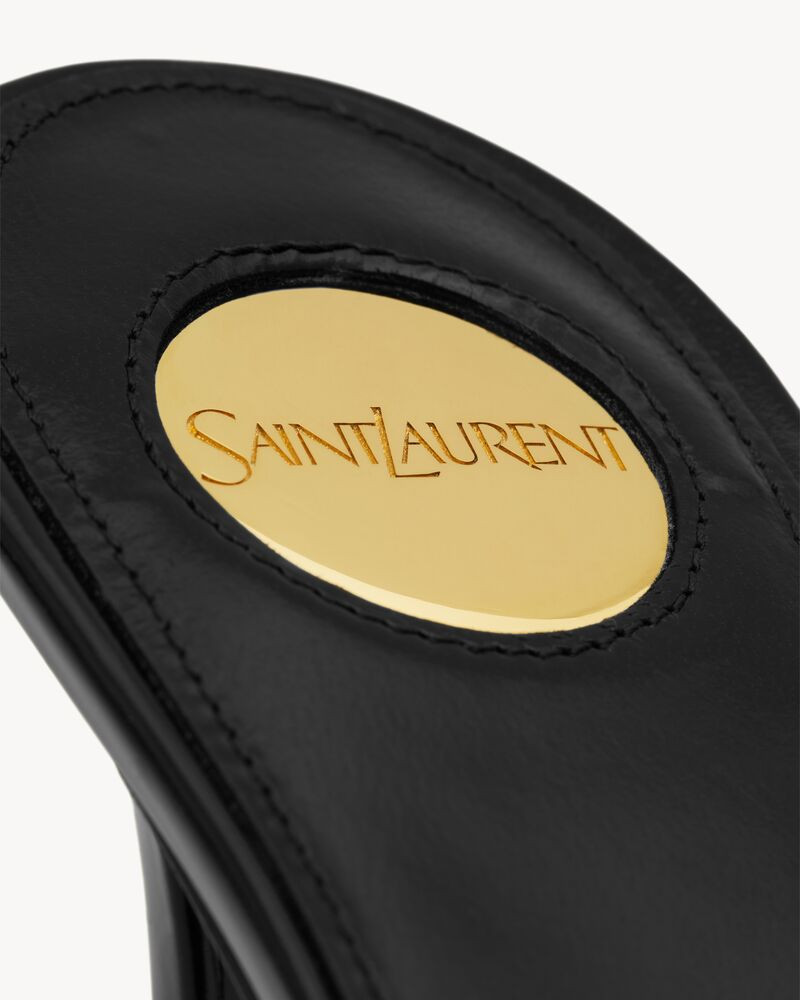 peep-toe mules with an almond toe and stiletto heel, featuring a round saint laurent-engraved met... | Saint Laurent Inc. (Global)