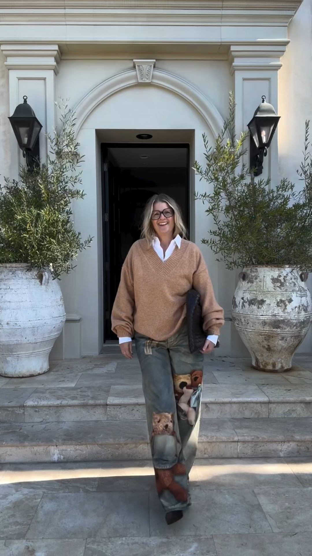 Day 5 of my Acne Studios week 🧸
My favorite pair yet — teddy bear printed denim. I styled them with a camel Urban Outfitters sweater, my new Khaite suede boots, and the Bottega Hop bag. Cozy, playful, and probably my favorite outfit this entire week (if not, ever). 

Which Acne pair has been your favorite so far?

#acnestudios #acnestudiosdenim #printeddenim #ootdfashıon #streetstyleinspo #fashionover50 #themichelleedit #bottegabag #khaiteboots
