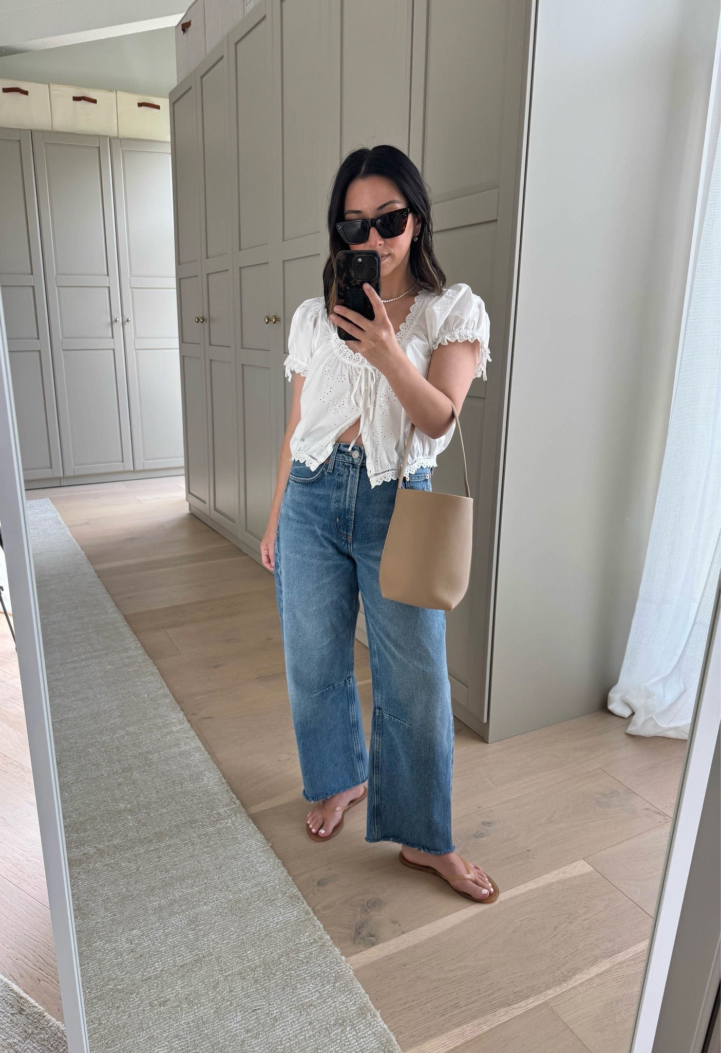 Citizens of humanity Miro jeans - maybe my favorite jeans. Slight curve, stunning wash! I did have to cut the hems on these. These run big, take your smaller size. 

DÔEN top small. Could wear the xs
COH Miro jeans 24, cut hems
Black Suede Studio sandals 35
The Row tote small
Celine sunglasses 
Dorsey James necklace 15”
Electric Picks earrings

#LTKmomlife #LTKootd #LTKPetite