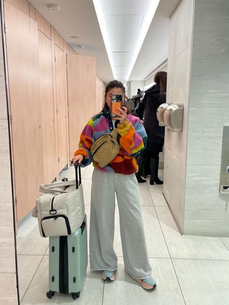 airport uniform 💕 obsessed with these wide leg sweats, wearing small + code VIVIANE15 
fleece, wearing small
suitcases linked + body bag :) 

#LTKtravel #LTKunder100 #LTKstyletip