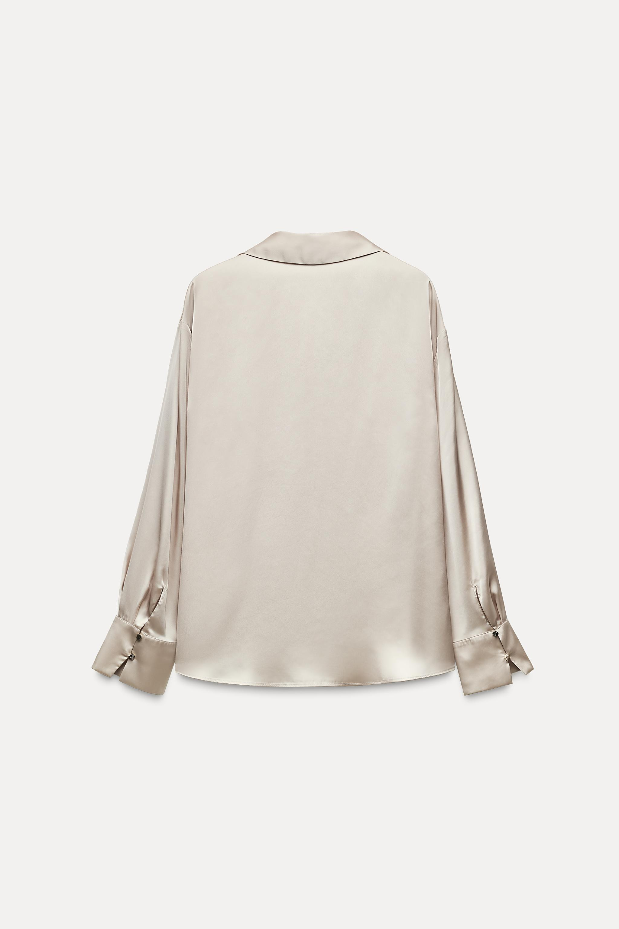 Flowy shirt with V-neck lapel collar and long sleeves. Front gold button closure. | Zara US