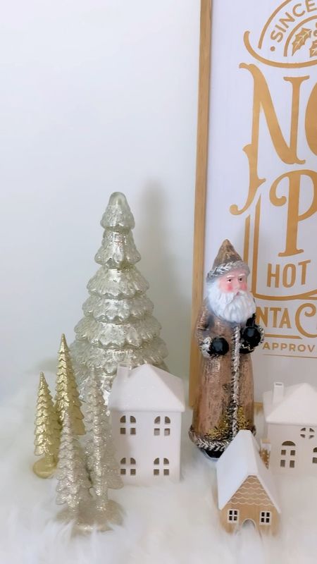 Create a whimsical winter village with White Houses, Mercury Glass trees, and white faux fur!! The beautiful thing is this will be so festive as Christmas decor, but the village houses and trees can stay up long after Christmas is over, as wintery decor. ❄️ 

If you're interested in this North Pole sign, you can find the tutorial on my blog under Christmas Magic, https://rouseinthehouse.co ✨

#LTKSeasonal #LTKHoliday #LTKhome