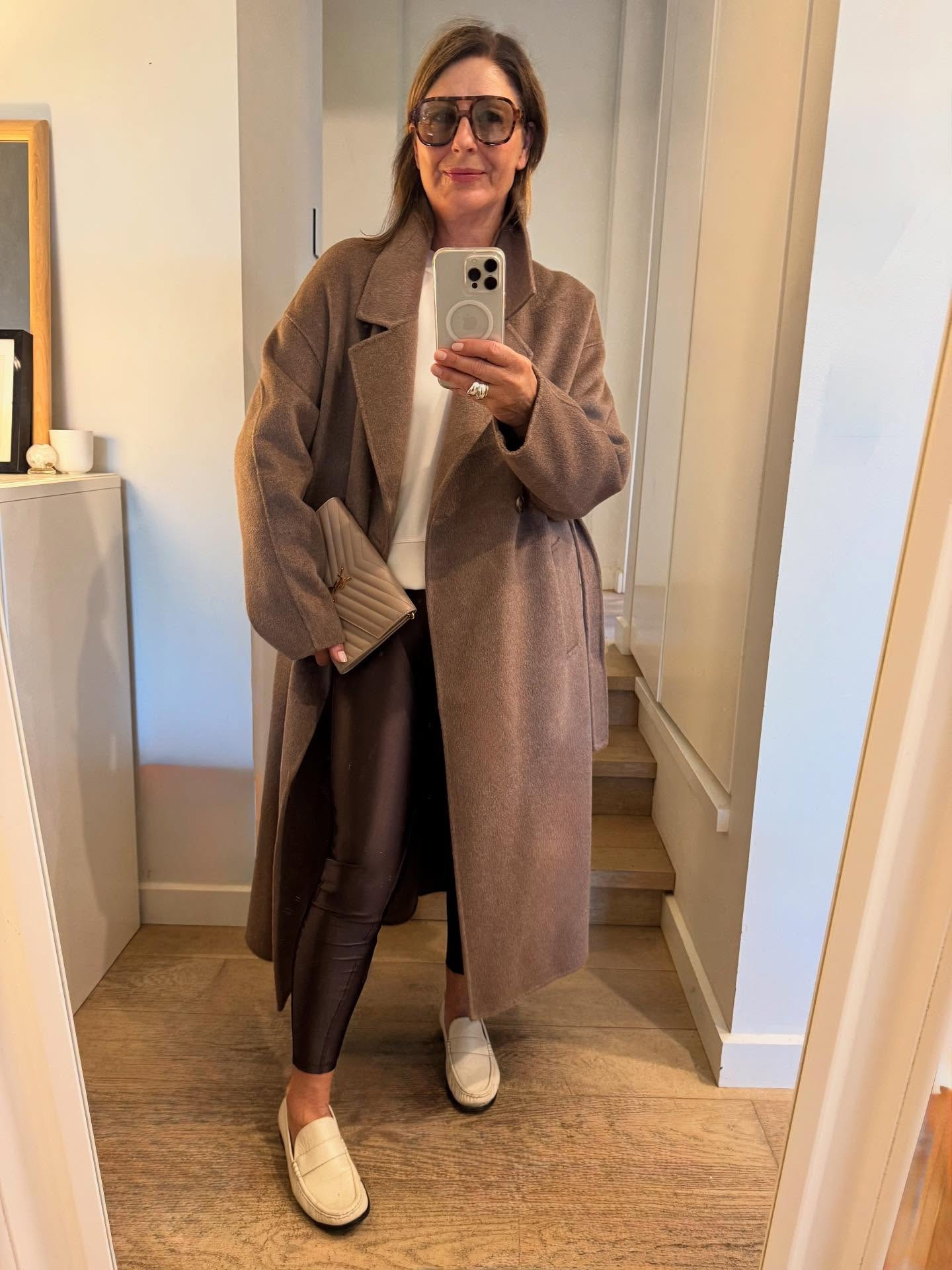 A fabulous brown winter coat @shopthecurated with shiny chocolate leggings @lululemonausnz ? 

Yes ! Of course ! 

Because fashion & style is all about contrasts: 
Pretty with tough.
Tight with oversized.
Hard with soft.
Casual with tailored.
Shiny with flat .
Masculine with feminine.
Sporty with dressed up.
That’s what gives an outfit an unexpected touch and a bit of tension & a look of effortlessness.

It’s all happening here where you have 
an oversized /tailored coats with sporty shiny casual leggings .
Perfect for the weekend, when you want to look chic but a little laid back. When comfort is key!

Styling tips:
* White loafers add a third colour & dress up the casual feel of the leggins @lululemonausnz .
* Stick to three colours on the body: that’s brown white & taupe .
* Add a small designer @ysl bag to elevate the lewk.
* Bags & shoes don’t need to match . 
* Don’t be afraid to mix textures like shiny leggins with a tailored wool coat @thefrankieshop 
* wear a cream sweatshirt as a layering piece like this one @lululemonausnz 

Shop the look here !
I’m wearing a large in the caramel coat 
And size small in the chocolate coat. 

#LTKstyletip #LTKaustralia #LTKwinter