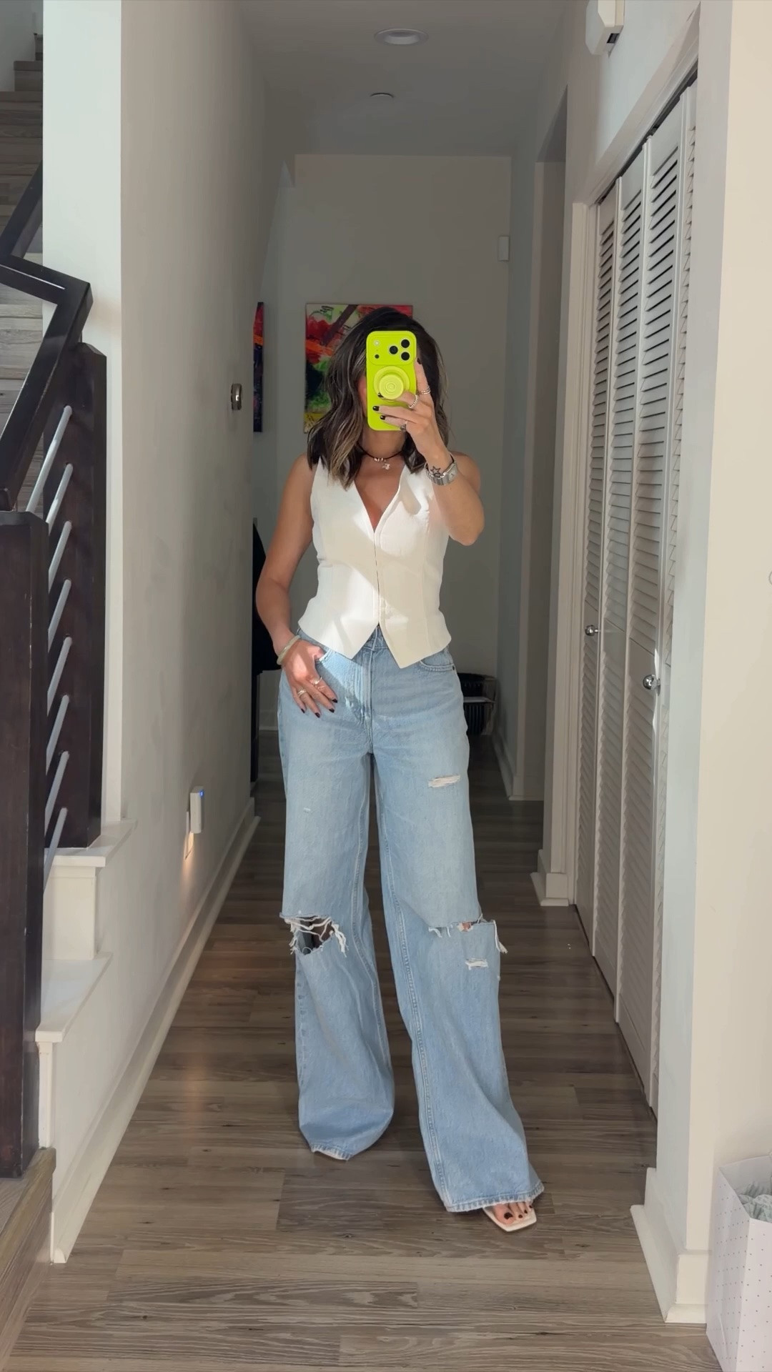 Summer outfits ⚡️ I love a pair of distressed denim. This wide leg fit is relaxed and effortless. Styled with the most flattering vest that I also got on another color—love the deep v-neck. Grab it on sale now during the Aritzia summer sale. 

OOTD, summer fashion, jeans, vest, sale, The Stylizt

#LTKootd #LTKdayinmylife #LTKSaleAlert