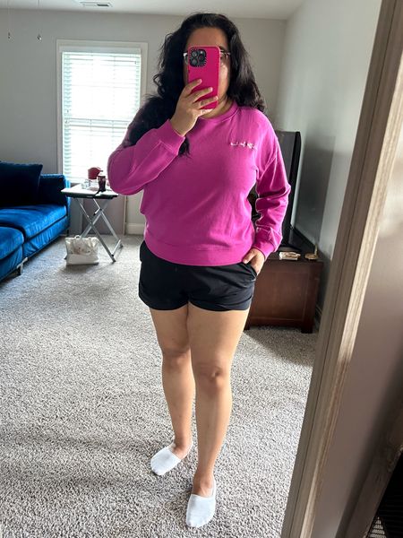 This cotton terry out of office sweatshirt is going to be a staple for vacation outfits! It’s such a pretty berry pink and is super cozy. I'm wearing a size large.
Pink sweatshirt, pink style, midsize fashion, midsize style, pink fashion, airport fit, travel outfit, mesh socks

#LTKStyleTip #LTKTravel #LTKMidsize