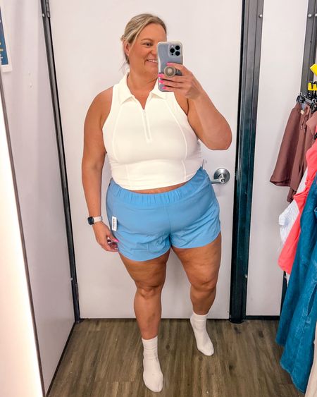 Activewear shorts and cropped polo top 

I would recommend sizing up in the shorts. I’m normally an 18/20 and these 2X are too tight. For a looser fit, I would get the 3X. The top is also a 2X and supposed to be a tight fit so fits TTS. 

#LTKOver40 #LTKActive #LTKPlusSize