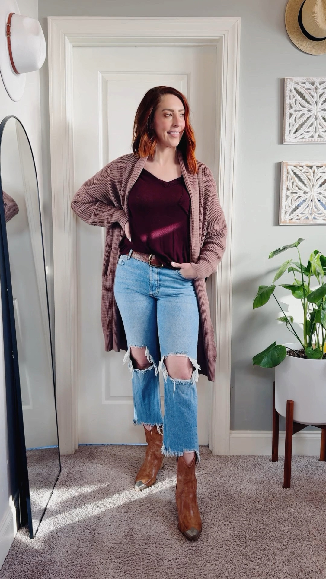 Western-inspired style with a minimalist twist—perfect for tall women who love effortless fashion!

Day 8 of my 31 Days of Closet Magic Challenge features cropped flared distressed jeans paired with a brown leather belt and a slouchy burgundy asymmetrical v-neck top that drapes beautifully (tall-girl approved for its perfect proportions!). I layered it with an oversized brown duster cardigan for extra warmth and finished the look with nude Western ankle boots for that subtle cowgirl vibe.

This outfit is proof that Western-inspired pieces can be sleek, understated, and ideal for tall women looking to create a flattering, timeless silhouette.

Are you a fan of Western minimalist style?
🤎 Yes, it’s my vibe!
👢 Sometimes, when I want to mix it up.

#ClosetMagicChallenge #WesternMinimalist #TallGirlFashion #TallWomenStyle #TallSizes #BohoWesternStyle

#LTKStyleTip #LTKShoeCrush #LTKMidsize