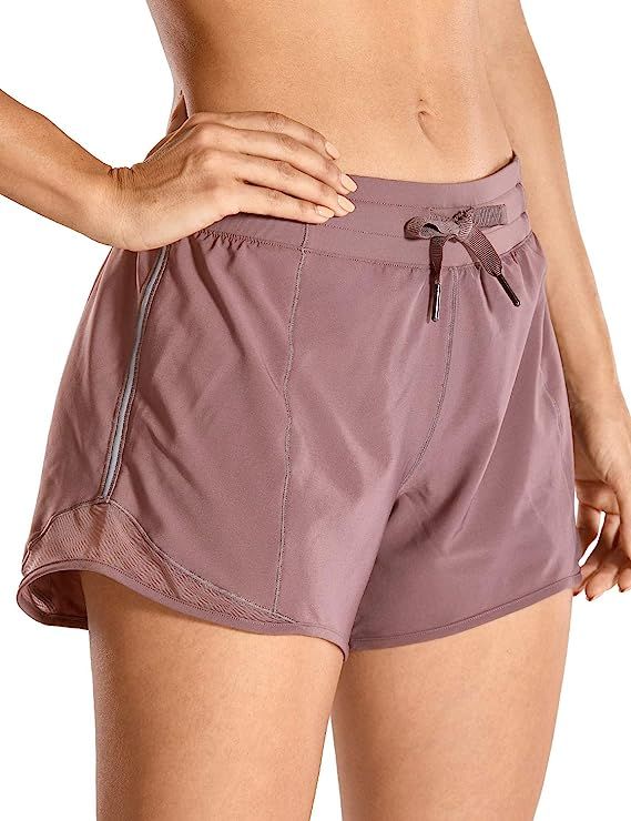 CRZ YOGA Quick-Dry Loose Running Shorts Women Sports Workout Shorts Gym Athletic Shorts with Pock... | Amazon (US)