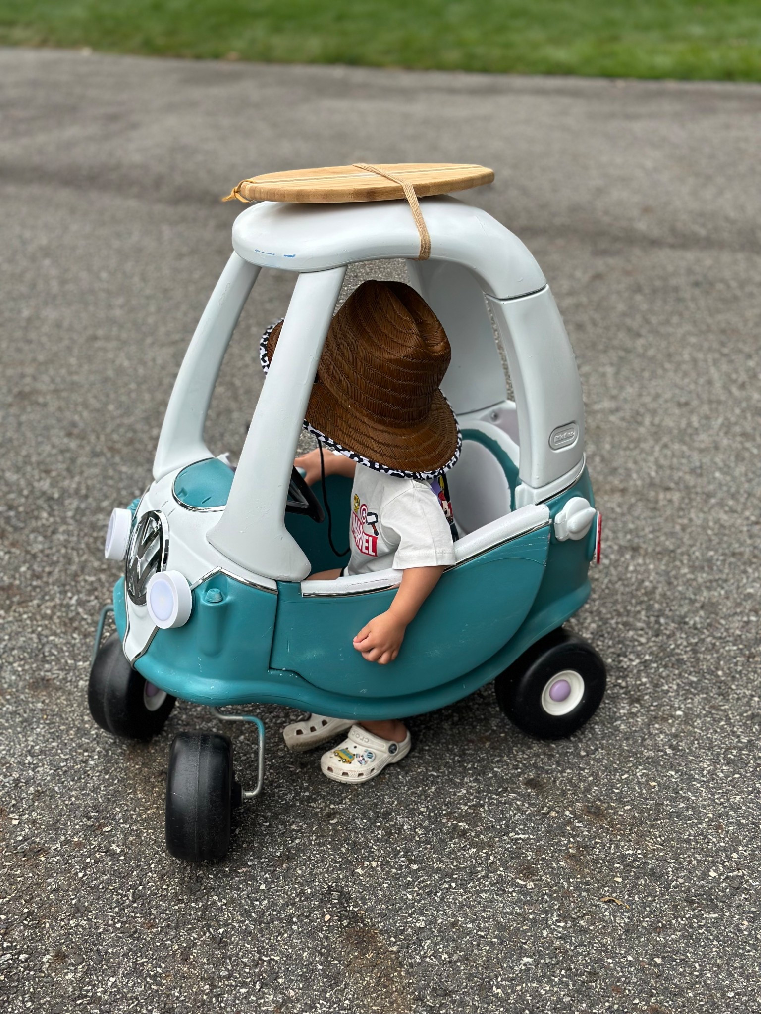 Little Tikes Cozy Coupe - VW inspired, surf themed makeover. My toddler absolutely loved it, especially the surfboard on top. A super easy spray paint DIY project!

#LTKHome #LTKFamily #LTKKids