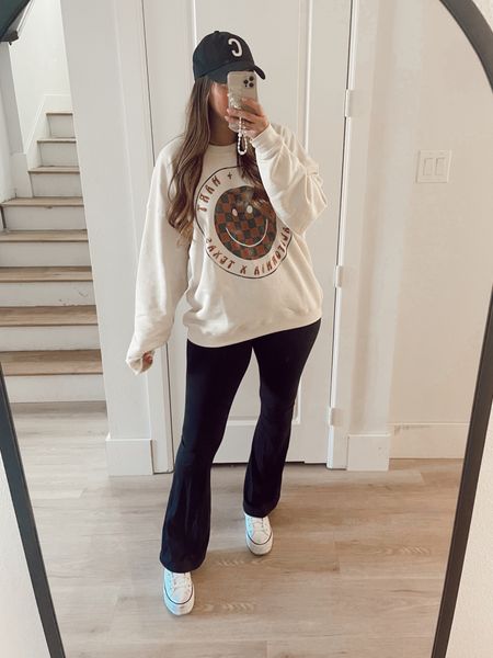 Casual outfit - oversized graphic sweatshirt (sized up twice XXL). Flare leggings (tts L long). Platform converse sneakers tts 9 

#LTKstyletip #LTKunder50 #LTKFind