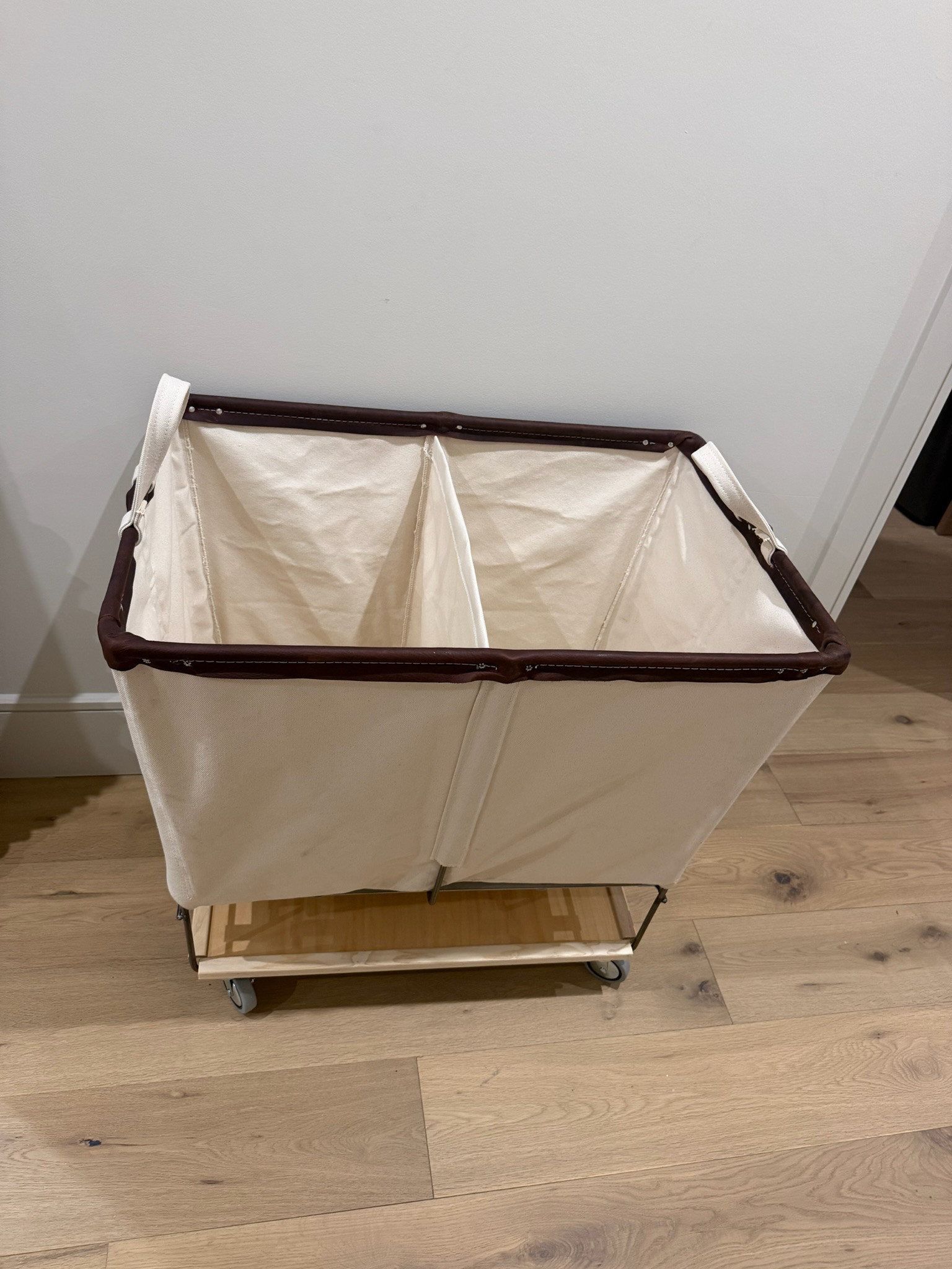 obsessed with the laundry bin- it has a divider and wheels so you don’t have to lift a heavy basket!! 🧺  Also added some similar ones!  

 #LTKHome