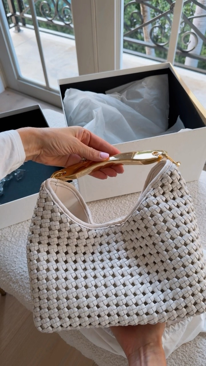 Stunning new white summer bag . 
Very elegant and sophisticated without the higher price tag!! Mine is the medium size , white color
Summer bag 
Summer outfits

#LTKU #LTKOver40 #LTKSeasonal