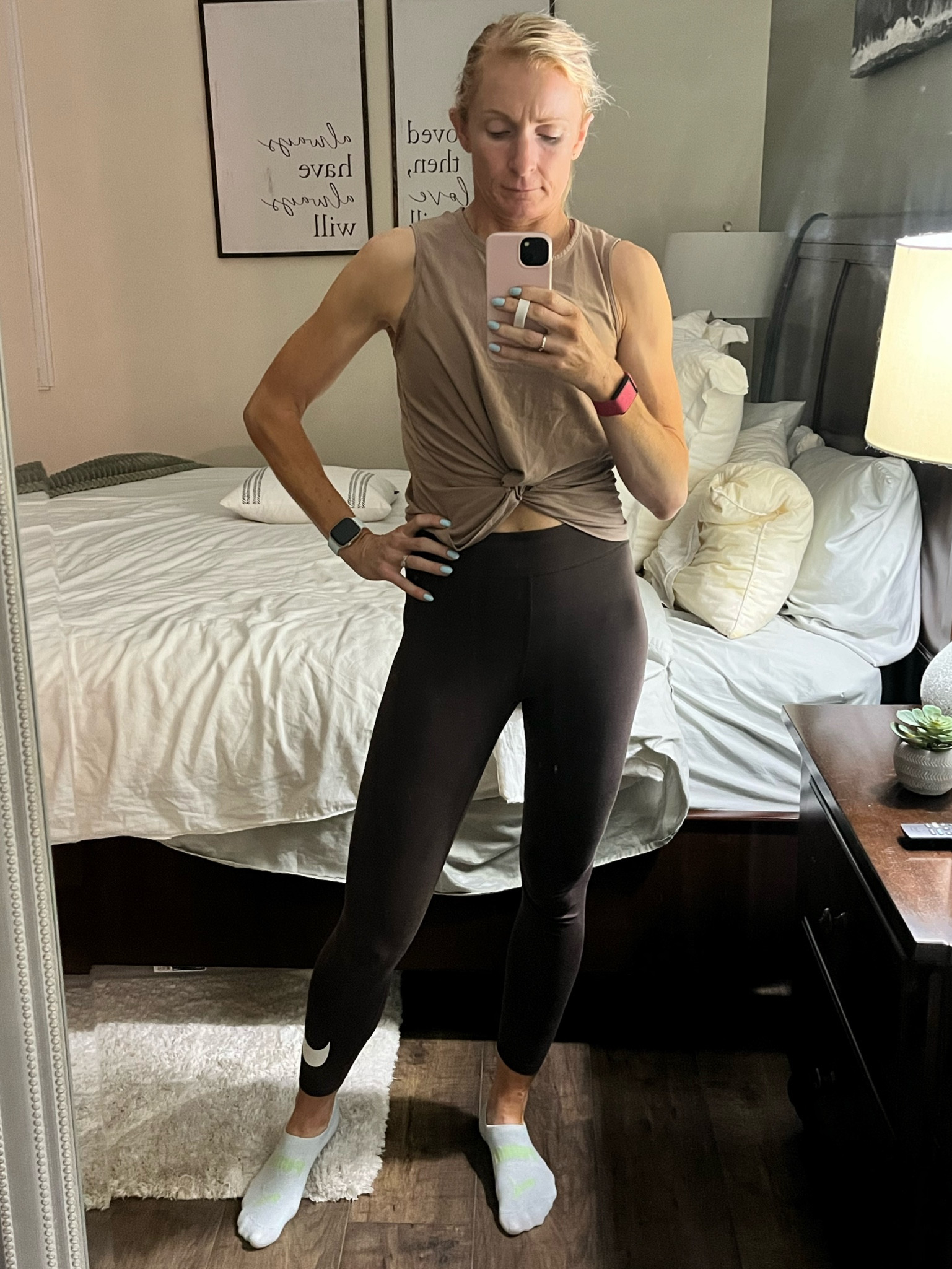Who else loves warm neutrals? 😉 these Nike leggings are also on sale for $34. Twisted top is a (lulu dupe) on Amazon. Linked below 👇 #nike #leggings #neutrals #gym #workout #luludupe #amazon 

#LTKover40 #LTKfitness #LTKfindsunder50