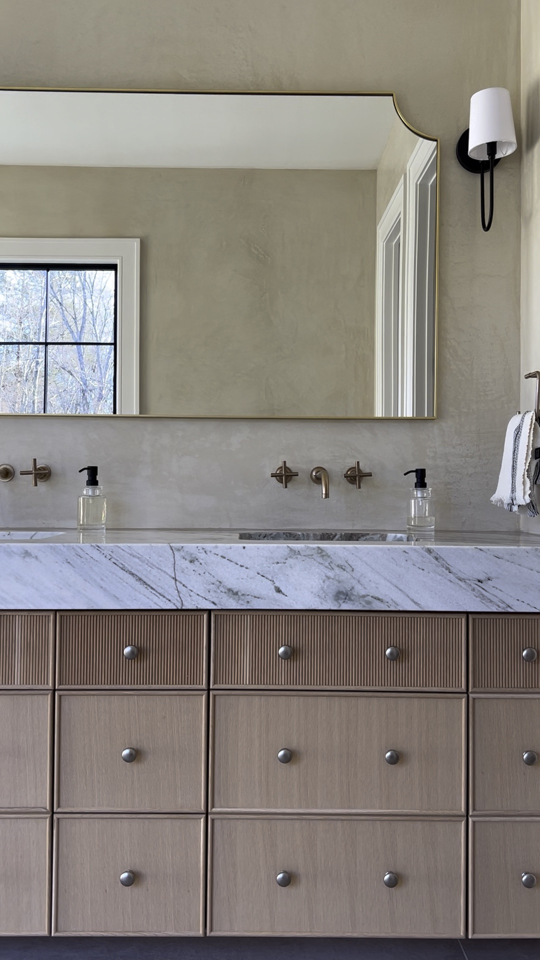 It is HARD to find a decent looking, large mirror. 

This one is from Rejuvenation and worth it. The shape of it is perfection. 

White oak vanity | bathroom mirror | bathroom faucets | kohler faucets 

#LTKHome