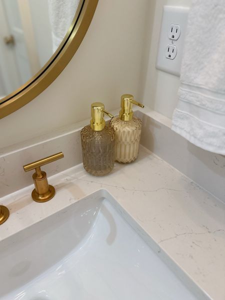 Gold soap dispenser, glass lotion dispenser, powder room, bathroom essentials, home decor

#LTKFindsUnder50 #LTKHome