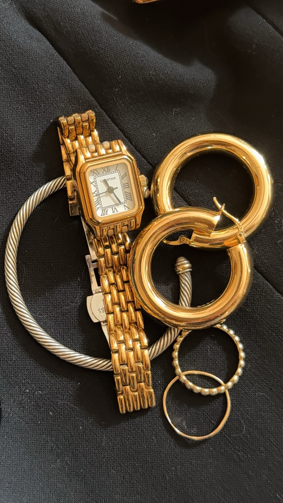 The perfect arm stack for me is a perfect blend of hi and low luxury. The David Yurman bangle paired with these gorgeous earrings and watch from Amazon, and Mejuri rings. Simple and classic. 

#LTKFindsUnder50 #LTKStyleTip