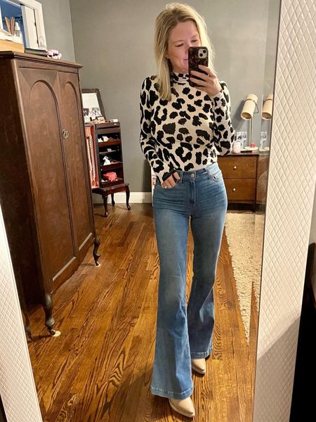 Fitted leopard print turtleneck, perfect alone or layered! Jeans are Paige. 

#LTKfindsunder50 #LTKstyletip #LTKover40