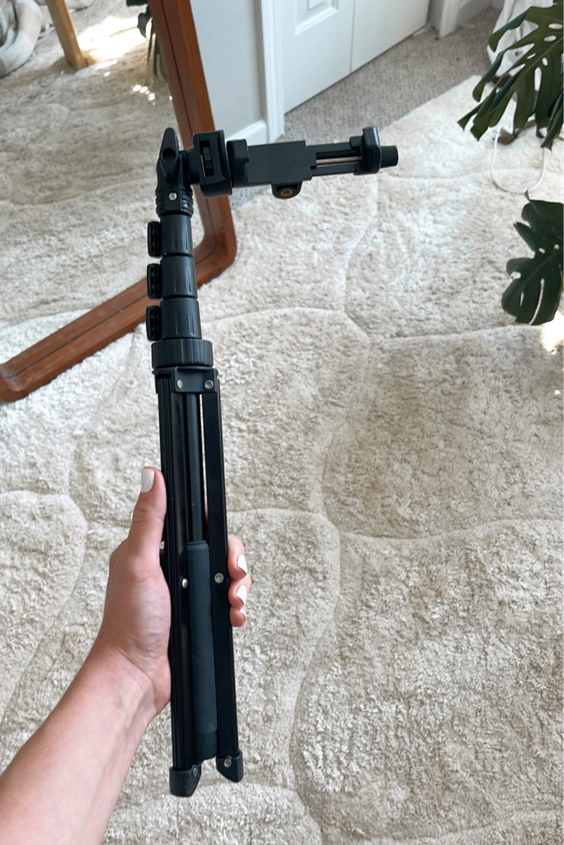 My favorite affordable ($15) tripod for my smartphone! It’s what I use to film content! 