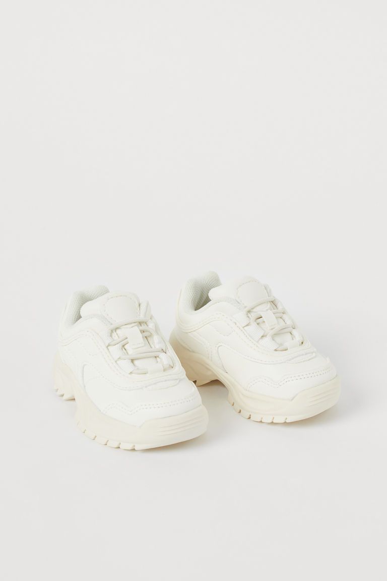 Sneakers in faux leather. Padded edge and tongue, elasticized lacing at front, and loop at back. ... | H&M (US + CA)
