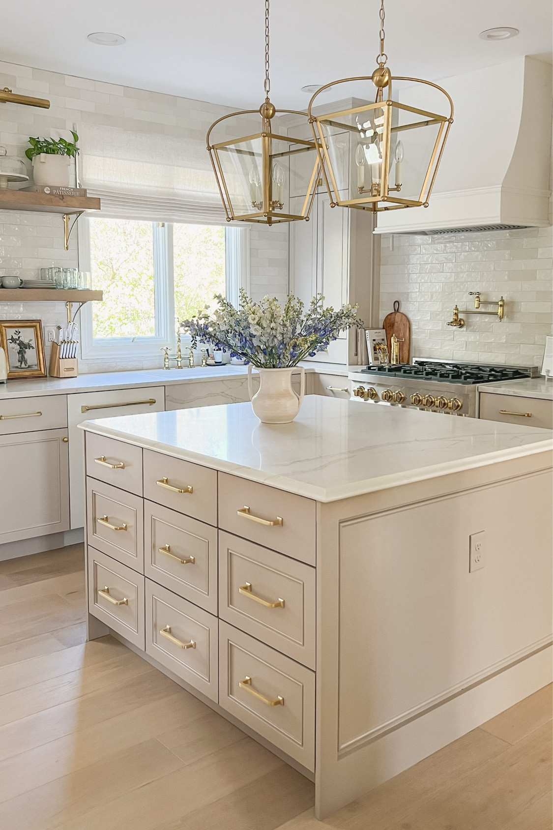 Paint colors
Island: SW Utterly Beige
Perimeter: SW Realist Beige
Walls: SW Greek Villa

Grout: Mapei Frost
Tile is in the color “white”

Roman shade is the coastal Roman shade from Select Blinds with motorization in the color White Linen.

Kitchen decor, home decor, floating shelves, pottery barn, spring decor, Zellige tile, quartz countertops, kitchen backsplash, dishes, Target studio McGee, world market

Nightstand
Nightstand, bedroom decor, home decor, spring decor, Ballard designs, table lamp, visual comfort, Target studio McGee, artwork, styling inspo 

#LTKSaleAlert #LTKSummerSales #LTKHome