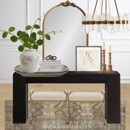Entryway design, console table, black console table, entryway rug, amber Lewis rug, neutral area rug, entryway lighting, gold chandelier, gold pendant light, gold mirror, Anthropologie dupe, upholstered ottomans, distressed planter, sketch art, entryway decor, decorative books

#LTKunder50 #LTKhome #LTKFind