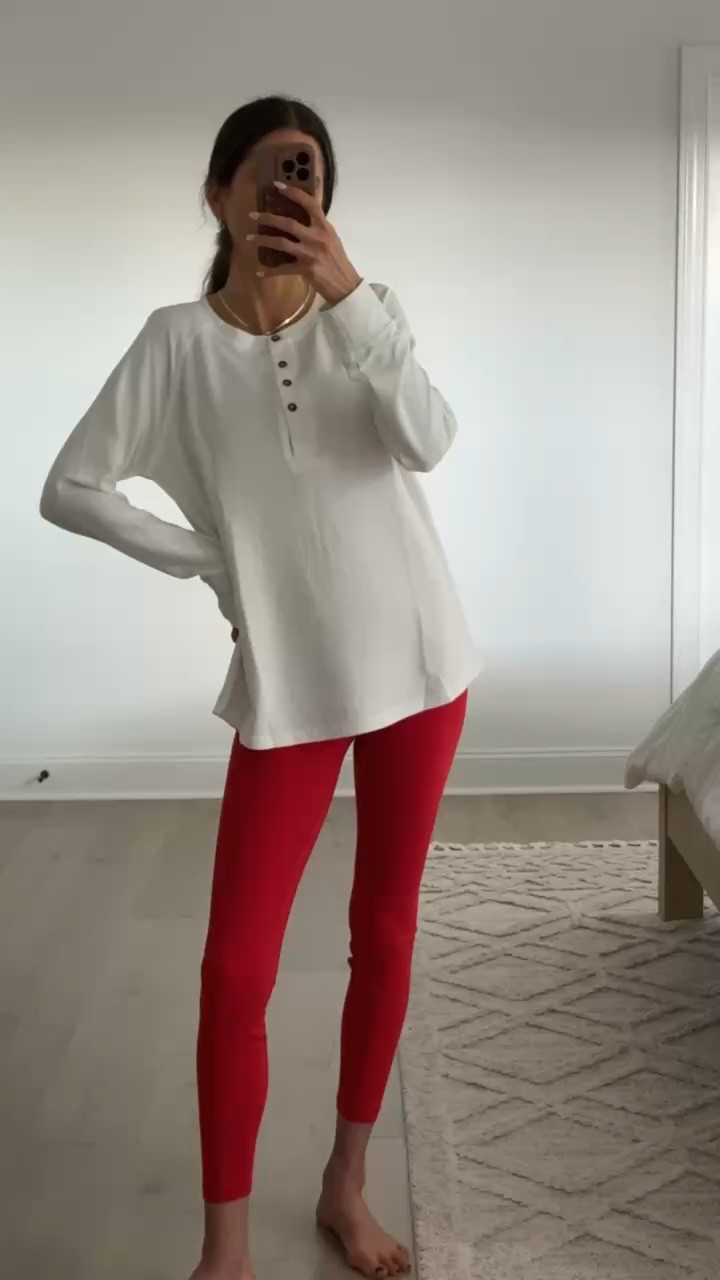 Classic white henley styled with red leggings and sneakers for an easy, everyday casual outfit. Soft, lightweight top with a relaxed fit that works for layering or wearing on its own. Perfect for athleisure wear, school drop off, running errands, travel days, or casual weekends. White henley top, leggings outfit, casual athleisure style, everyday mom outfit, comfortable casual wear, relaxed fit top, spring casual outfit, simple everyday style.

#LTKootd #LTKFindsUnder50 #LTKfitnessgoals