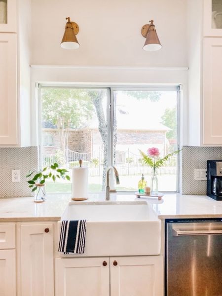 A view from my kitchen with these shoppable items linked. Farmhouse Living | Primary Kitchen | Kitchen Ideas | Interior Design | Gold Accents | Wall Sconce | White Sink | White Wall Mosaic Tile

#farmhouseliving #primarykitchen #kitchen #kitchenideas #kitchendecor #kitcheninspo #interiordesign #homedesign

#LTKfamily #LTKFind #LTKhome