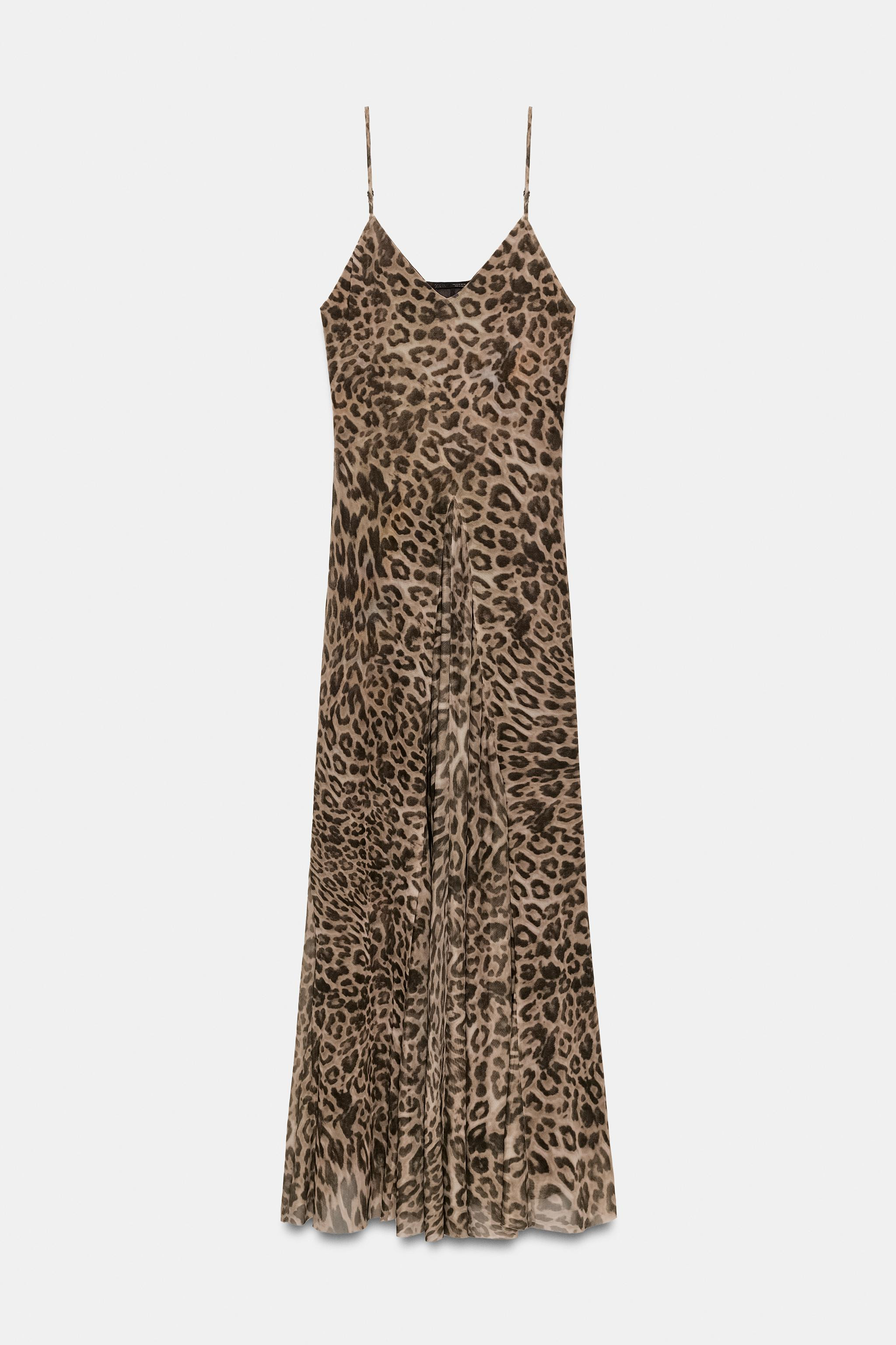 Long dress with V-neckline and adjustable spaghetti straps. Tonal matching interior lining. Godet... | Zara US