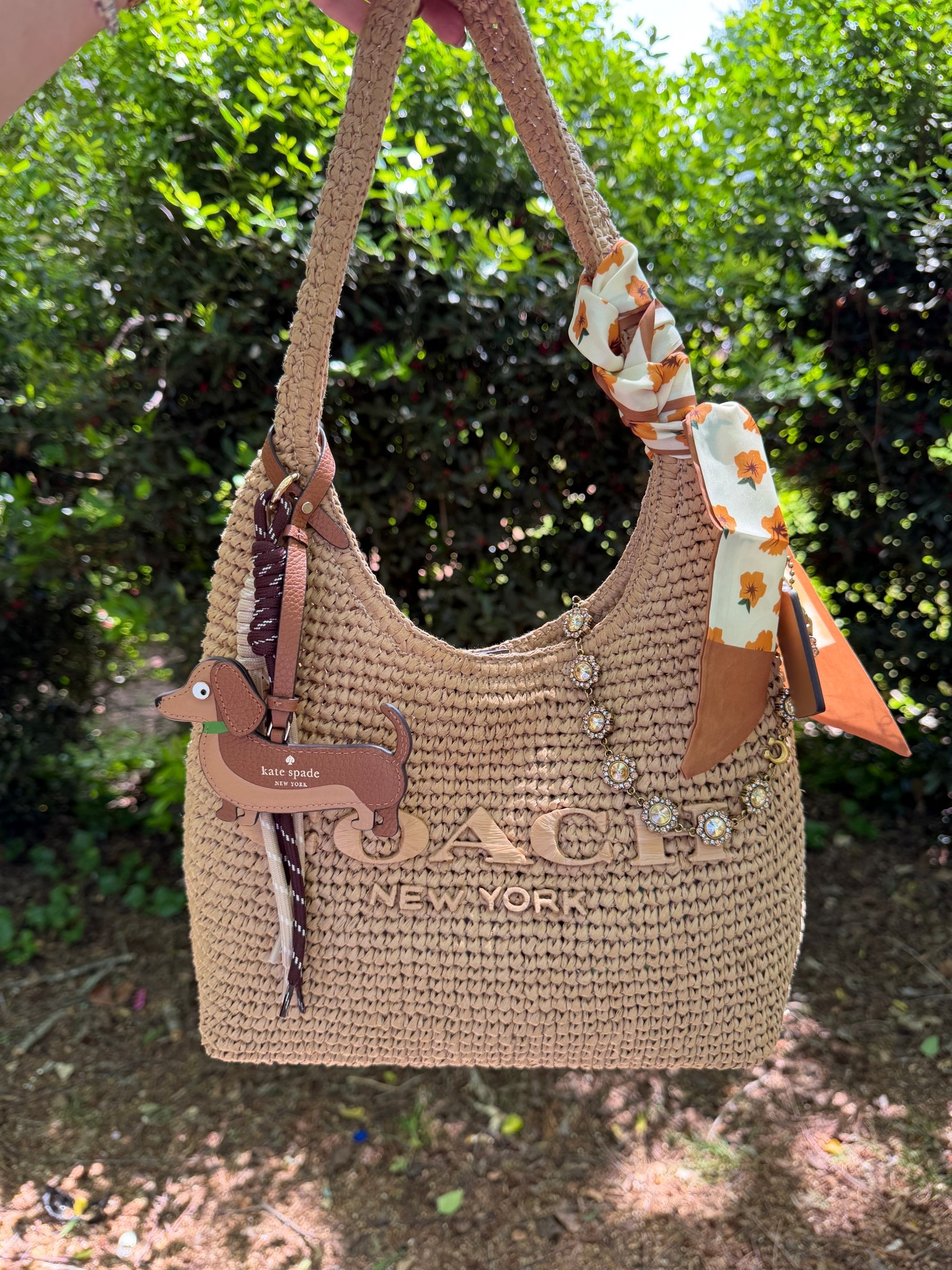 Bag of the day 
Coach Brooklyn 28 straw bag
Kate spade dog charm 
Bag charm

#LTKMothersDay #LTKgrwm #LTKootd