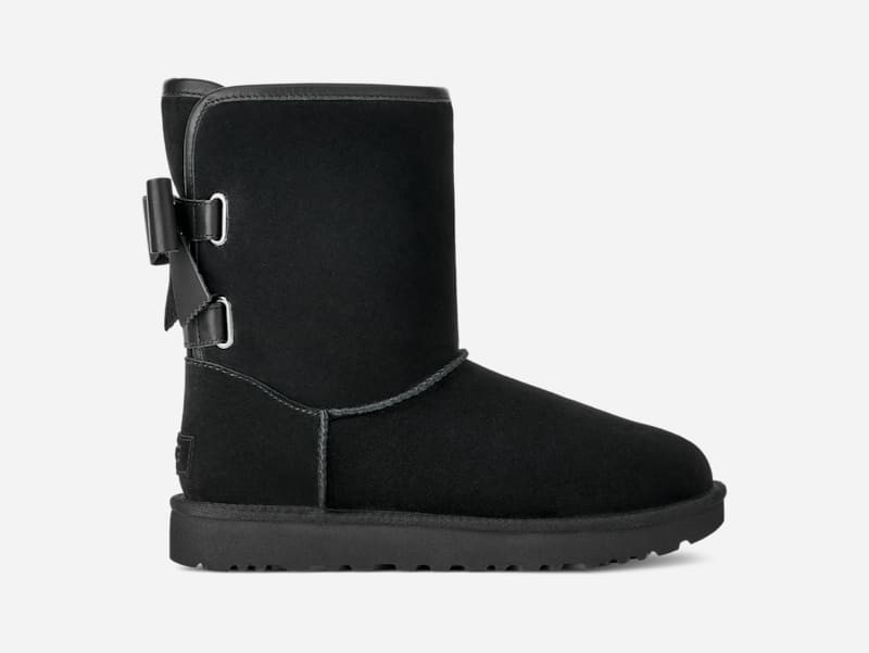 UGG® Women's Short Bailey Leather Bow Suede Classic Boots in Black, Size 11 | UGG (US)