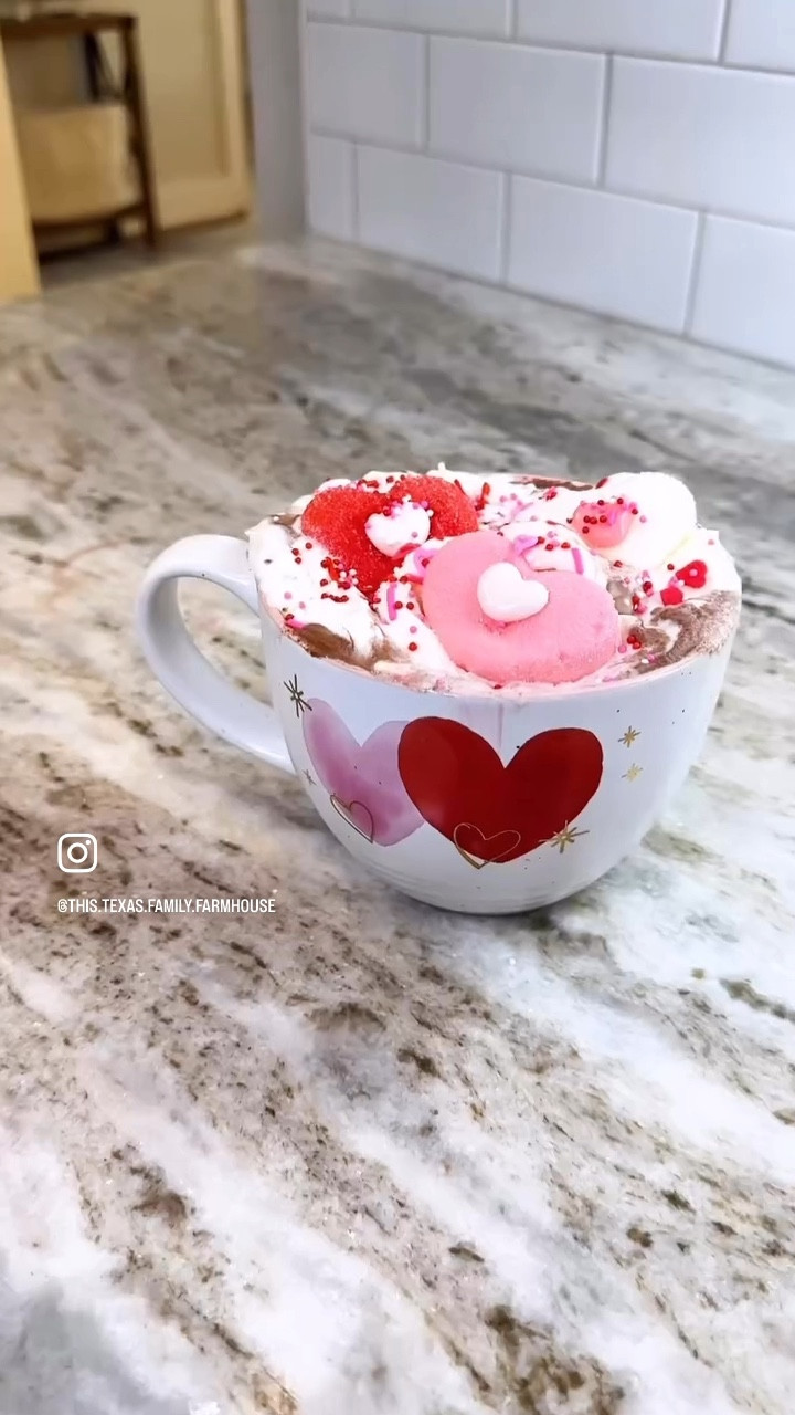 Top your cocoa with love & try this for your Valentine's Day Treat! ☕️♥️

These Valentine Cool Whip toppers are easy to make wether you purchase a heart marshmallow or use a heart- shaped cookie cutter to create your own, your cocoa will have lots of love and will be oh-so-sweet! 💕 Perfect for a cozy night or to impress your Valentine! Will you try this?

Don't have a marshmallow, but still want a fun festive heart-shaped topping? Try this instead:
1. Prep the Cool Whip by spreading evenly on a parchment-lined baking sheet.
2. Place cool whip in freezer for 2 hours.
3. Use a heart-shaped cookie cutter to cut the frozen Cool Whip.
4. Dust the heart shapes with pink sprinkles, cocoa powder, mini marshmallows or edible glitter.
5. Place a heart-shaped topper on a cup of hot cocoa, watch it melt, & enjoy!
#valentinesdayideas #hotcocoatoppers
#diyvalentines #hotchocolatebar #hotcocoa #coffeelover #EasyValentinesDayTreats #cozyvibesonly #easydesserts #simplerecipes #winterfood #Itkhome #itkvideo #itkvday


#LTKKids #LTKSeasonal #LTKHome