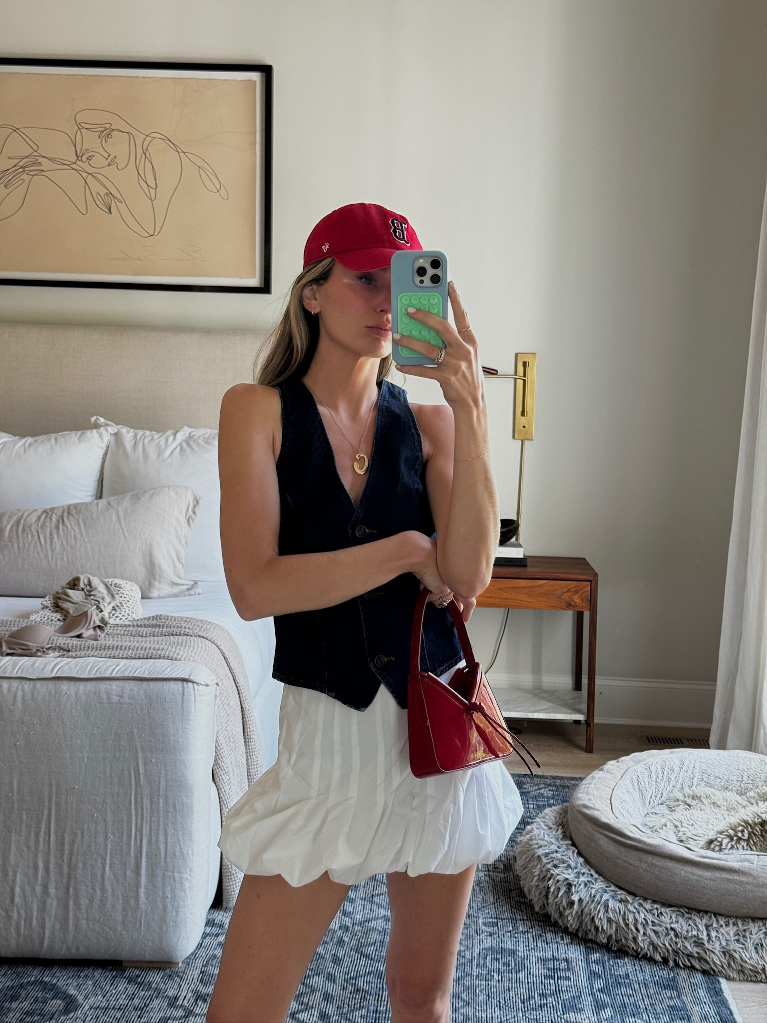 Don’t tell my dad I’m wearing this hat but I had to for the ‘fit. The mini bag might be my fave thing from the haul! Wearing an XS in the vest and the skirt

#LTKSeasonal #LTKStyleTip #LTKSummerSales