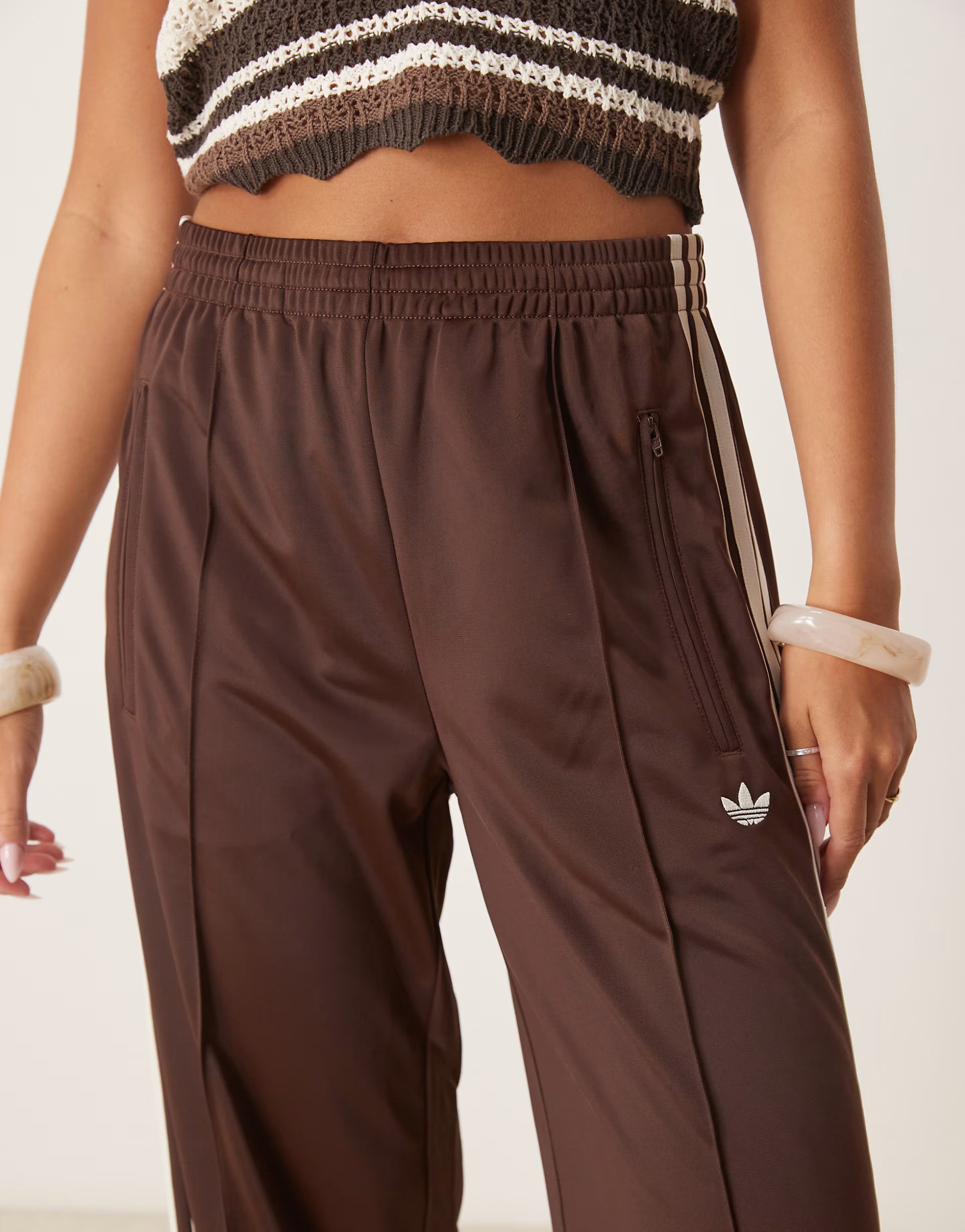 adidas Originals Firebird Loose track pants in brown | ASOS | ASOS (Global)