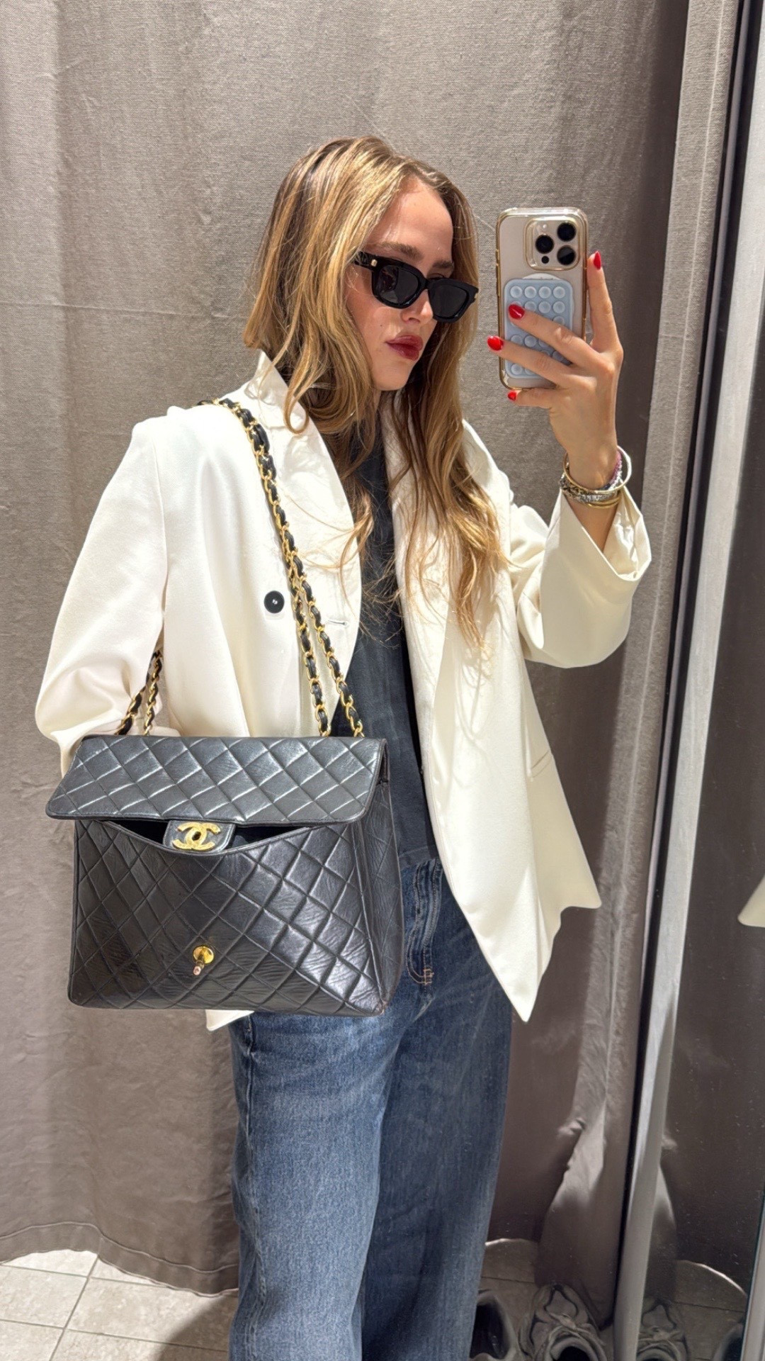 Easy chic outfit— white, oversize cream blazer , black Chanel bag, vintage tee, and a great baggy jean

#LTKWorkwear #LTKSaleAlert