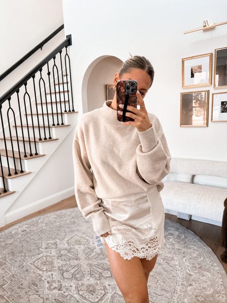 THIS IS EVERYTHING!!! 12/10 obsessed obsessed obsessed!!!!!

So romantic, flirty and FUN. I love the different textures to this monochromatic look. ❤️‍🔥 and the details in this skirt are 🤌🏻

Wearing a size small in the SWEATER, I could def see some of my sensitive girlies getting itchy in this. Color pictured is ‘beige melange.’ 🫶🏻 For the SKIRT I am wearing a size 4 and this baby for sure needs nude undergarments to be worn underneath. 🫣 

Would also look adorable with an oversized t shirt dress!

#LTKfindsunder50 #LTKstyletip #LTKfindsunder100