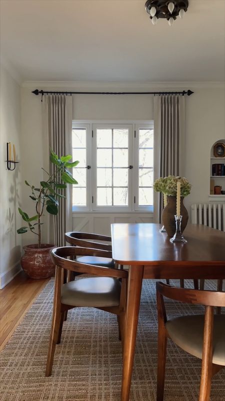 3 simple dining room updates. *rugs (on sale!), rug pad, pleated curtains, curtain rings, dining table and chairs, clay vase, wall candleholder

#LTKhome #LTKsalealert #LTKstyletip