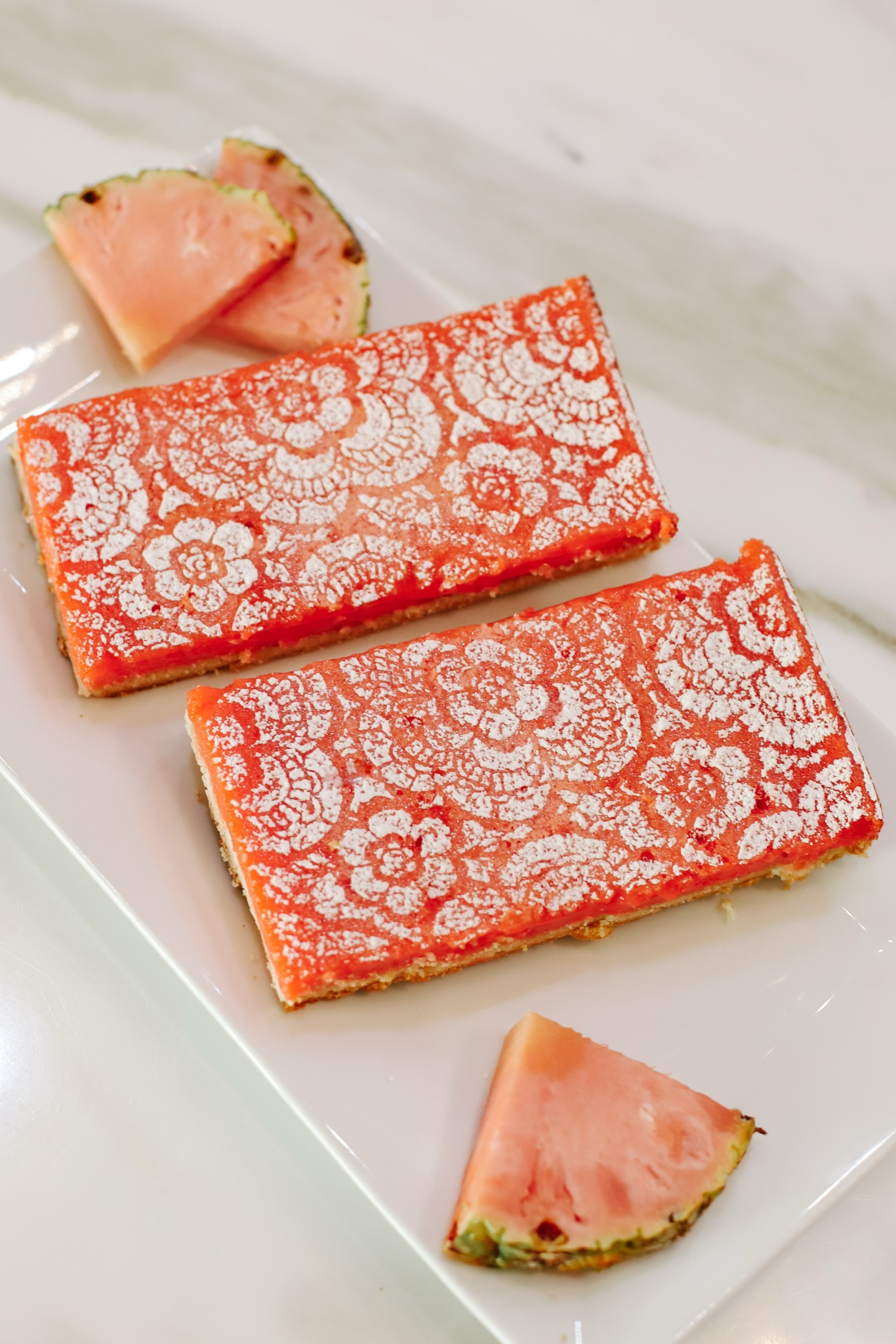 Impress your Valentine this year with these @pinkglowpineapple PINK pineapple bars! 💗 See FULL RECIPE below👇🏼and head on over to @pinkglowpineapple for more details on how you can get a Pinkglow® Pineapple for your Valentine! #ad #PinkglowPineapple 
 
SHORT BREAD CRUST:
2 cups flour 
1 cup softened butter 
2/3 cup powdered sugar 
 
PINEAPPLE FILLING 
2 cups diced Pinkglow® pineapple (purchase at pinkglowpineapple.com) 
2 cups sugar 
1/3 cup flour 
4 eggs 
2 TBSP lemon juice 
1 tsp baking powder 
½ tsp salt 
powdered sugar (garnish) 
 
Preheat oven to 350 degrees and grab a 9x13 inch baking dish. Mix all crust ingredients in bowl until a dough is formed. Press dough in pan and bake 18-20 minutes, until sides are golden brown. While the crust is baking, add all filling ingredients into the food processor or blender. Pour the smooth pineapple mixture onto the hot crust and bake for an additional 25-30 minutes. Dust the cooled bars with powdered sugar. 
 
@delmontefresh @tropicalfruitboxusa @melissasproduce #DelMonteFreshProduce #FreshDelMonte #pinkpineapple #valentinesrecipe 

#LTKParties #LTKHome #LTKGiftGuide