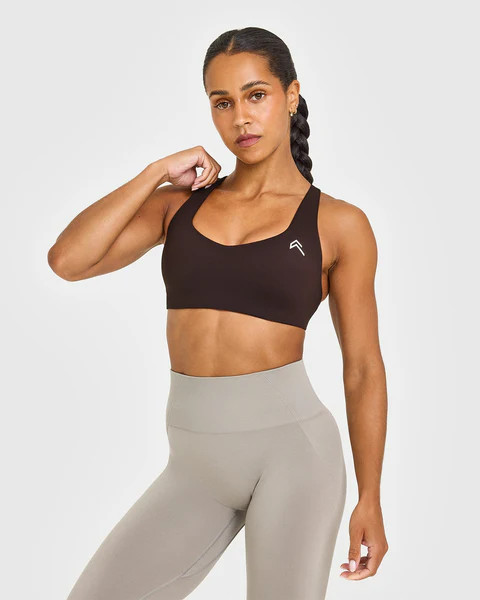 EasyLift™ Cross Back Sports Bra with White Logo 
 70% Cocoa | Oner Active (UK / US)