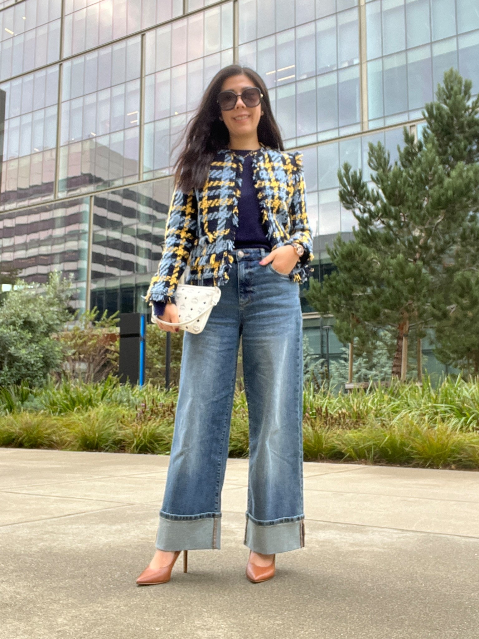 For today’s casual yet professional look, I wore the latest addition to my closet, these light washed, wide legged, cuffed denim jeans. I’m typically not a fan of cuffed pants since it makes me look shorter but with high heels, it works! My workplace is pretty laid back but I wanted to spruce this look up a little so I layered up my cashmere top with a blue and yellow tweed jacket.

#tweedjacket #businesscasual #widelegjeans #flarejeans #9to5style #bouclejacket #cashmeresweater #oldmoneystyle

#LTKWorkwear #LTKPetite #LTKootd