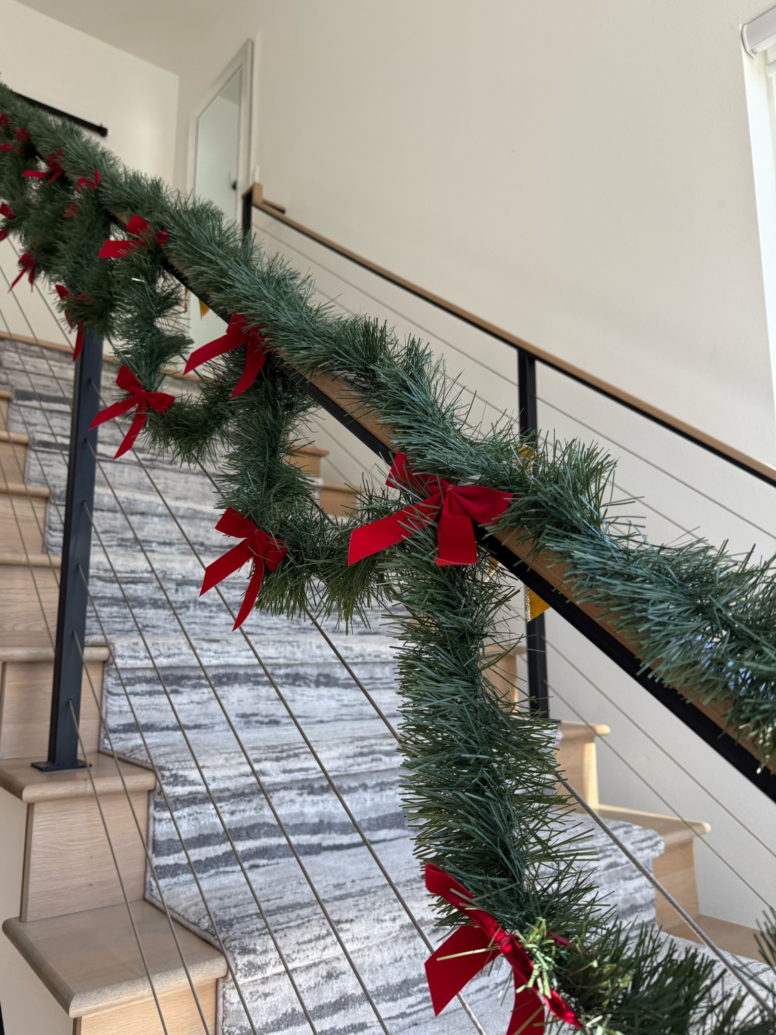 We have used this Garland over and over. It’s the perfect simple Christmas basic! I love the addition of the mini red bows this year to spice it up ❤️🎀

#LTKHoliday #LTKSeasonal #LTKStyleTip