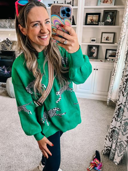 Obsessed with this fun green sweater! It’s perfect for fall or winter! Great Christmas sweater too with the color! These are also hands down the best black leggings ever! Winter outfit • casual outfit • animal print • red dress boutique 

#LTKover40 #LTKSeasonal #LTKstyletip