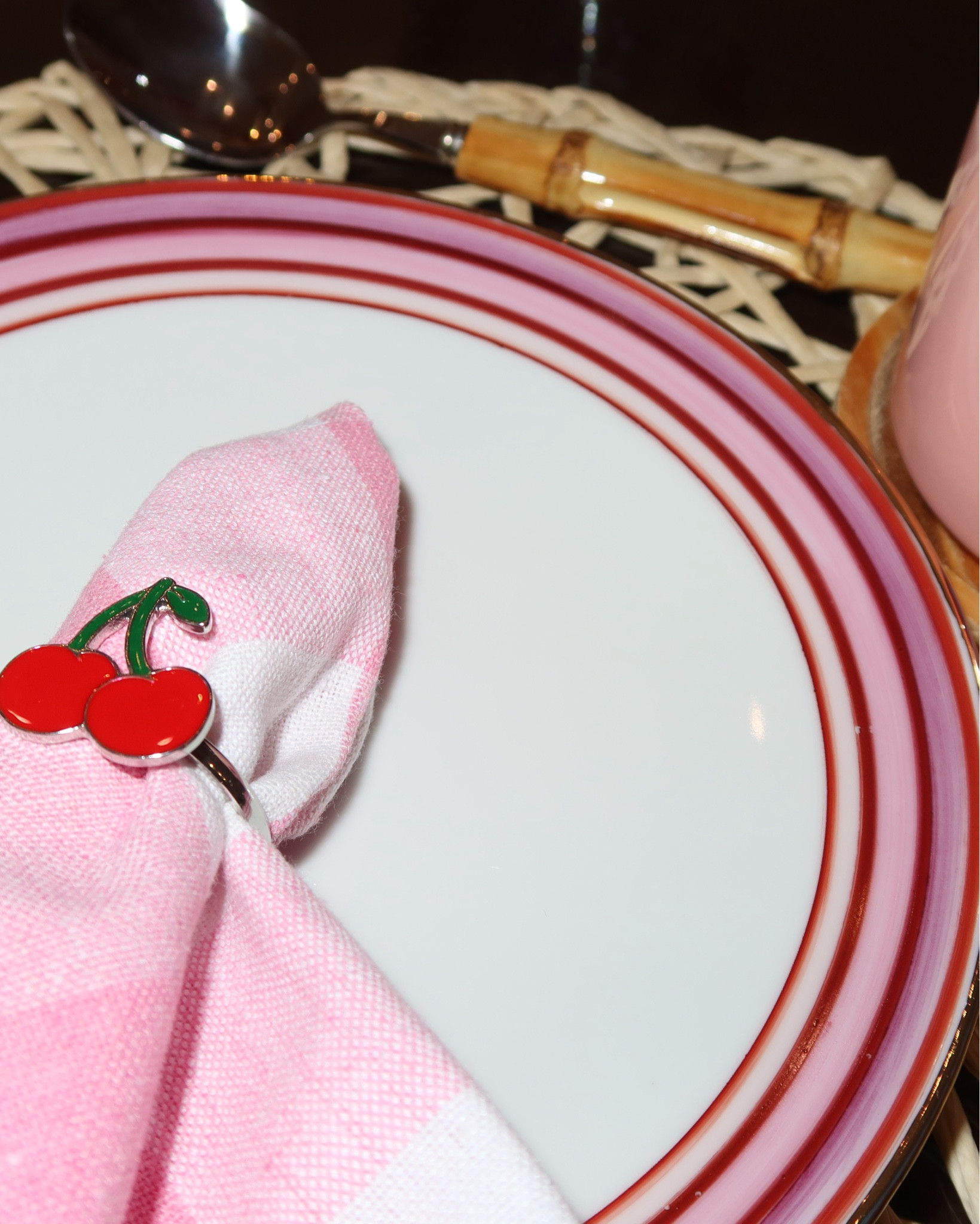 Pink Napkins and Cherry napkins ring 

#LTKHome #LTKFamily