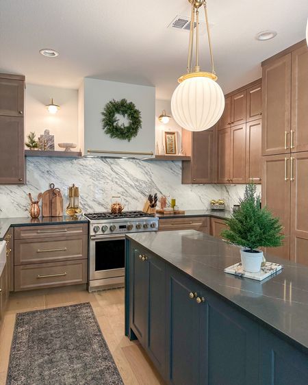 Holiday decor in my kitchen including this cute mini Christmas tree and affordable wreath I hung on my range hood!

Target holiday, pendant lights, countertop styling, cabinet hardware 

#LTKhome #LTKHoliday #LTKfindsunder50