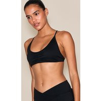 Black Sculpt Ruched Front Strappy Sports Bra | PrettyLittleThing US