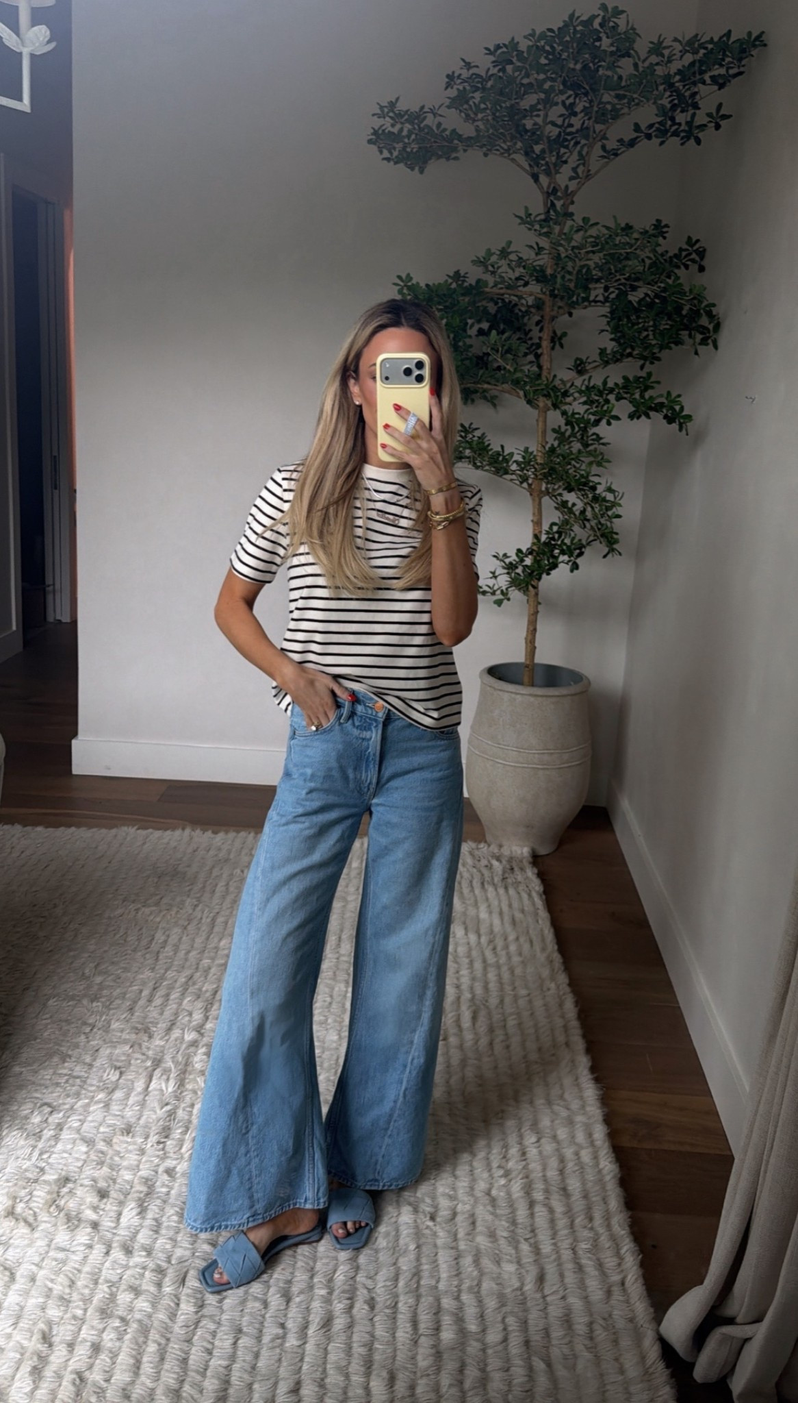 Wearing XS in tee, 25 in jeans 
Sandals are true size!