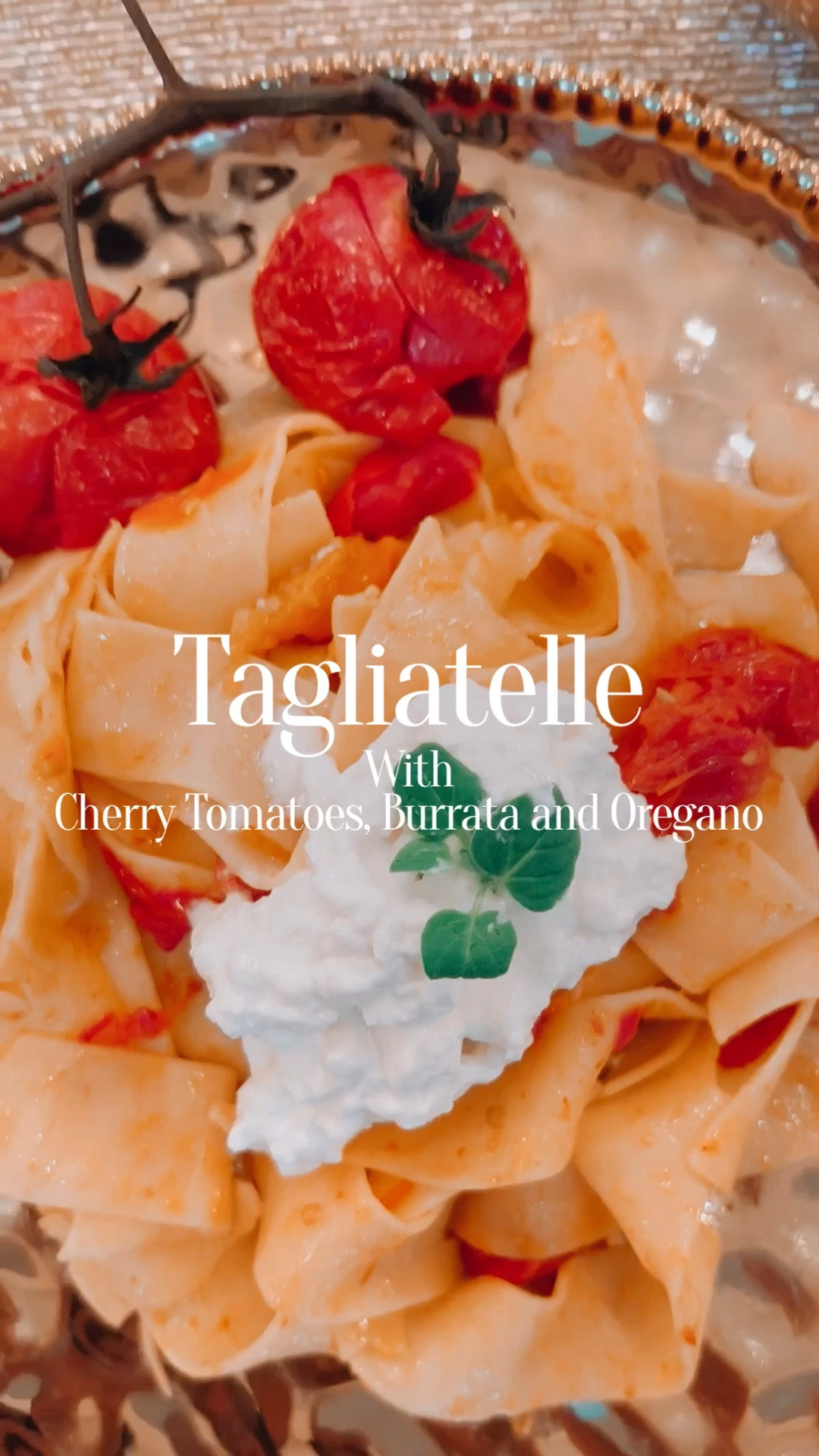 Tagliatelle with cherry tomatoes, burrata, and fresh oregano is a wonderful example of how simple ingredients can come together to create a sophisticated and delicious dish.
The egg pasta provides a delicate and silky texture that pairs perfectly with the creamy and rich burrata cheese. The burst of sweet and juicy cherry tomatoes adds a lovely contrast to the dish, while the fresh oregano adds an herbaceous and slightly peppery flavor that ties everything together.
Having a meal that's easy to prepare but still impressive is a great way to foster conviviality and bring people together. When you have something delicious on the table, people tend to linger longer and enjoy each other's company. In my house, it happens all the time! 

6 Red Cherry Tomatoes Sprigs
2 cups yellow cherry tomatoes
6 tagliatelle nests
8 oz fresh Burrata
2 cloves garlic
fresh oregano
olive oil
salt and pepper

1. Bring a pot of salted water to a boil. 
2. Place the tomatoes on a cookie sheet, season with salt, pepper, and olive oil, and place them in the oven (400 degrees) for 20 minutes.
3. Heat 2 tablespoons of olive oil in a pan, and add 2 garlic cloves. 
4. Once the tomatoes are ready, place half of them in the pan with the garlic and cook them for 5 minutes. Keep the other half warm with foil. 
5. Cook the tagliatelle “al dente.”
6. Once ready, place them in the pan and gently mix for 1 minute.
7. Assemble the plate. Place the tagliatelle, and add the burrata and the fresh oregano on top. Garnish the plate with one sprig of tomatoes. Serve immediately. 



#LTKhome