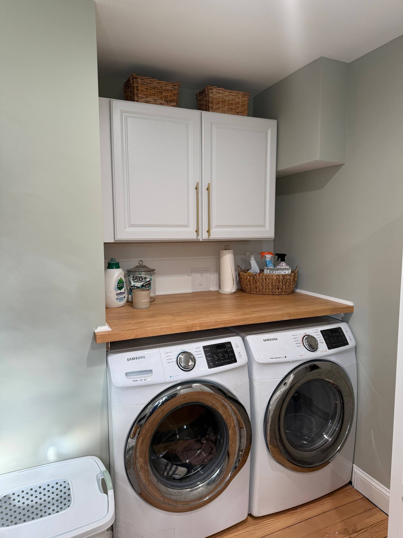 My new laundry nook area sure beats going down into the basement!  Love a simple clean look 💖