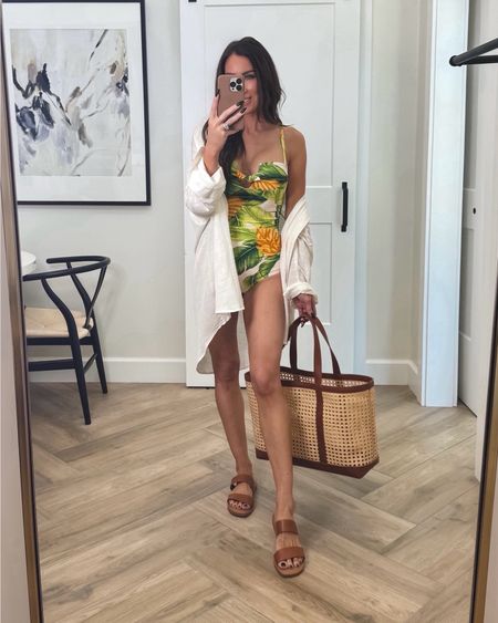 This tropical swimsuit is an instant favorite!!!  This print is so fun and gives luxe summer vibes . The fit on this one is incredible! Detachable straps and runs tts sz small
Shirt is not part of sale but still a great
Price  Sz med sized up for an oversized fit 
Bag looks designer and is stunning 
Sandals! I also bought in gold and they run tts


#LTKswim #LTKover40 #LTKfindsunder50