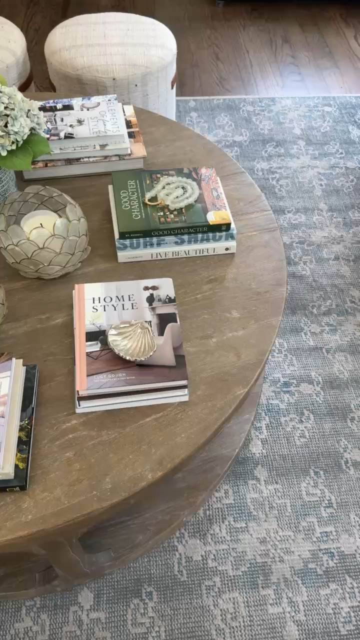 Coffee table styling is all about the layers. Stacked design books, hydrangeas, candles, and a few sculptural accents make this oversized table feel collected and lived in.

coffee table styling, coffee table decor, design books, hydrangeas, living room decor, home styling, decorative accents, neutral interiors, classic home decor, girlonthehudson

#LTKHome #LTKSeasonal #LTKOver40
